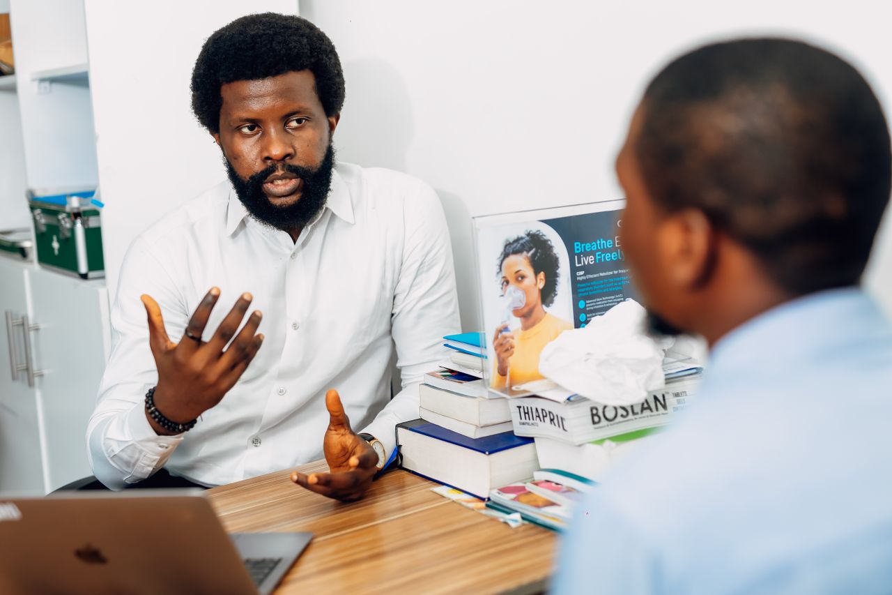 From Data to Harvest: Driving Agricultural Project Success in Uganda Through Rigorous Feasibility Studies A doctor discusses health concerns with a patient at a medical office in Lagos, Nigeria.